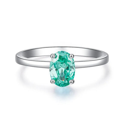 Bague solitaire pierre ovale turquoise argent 925 élégante - vue latérale
