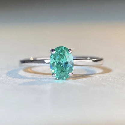 Bague solitaire pierre ovale turquoise argent 925 élégante - vue de face
